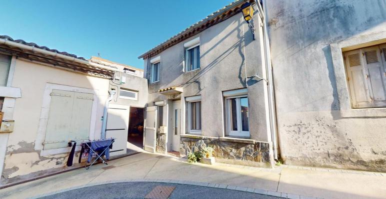 Maison de village avec garage et cave